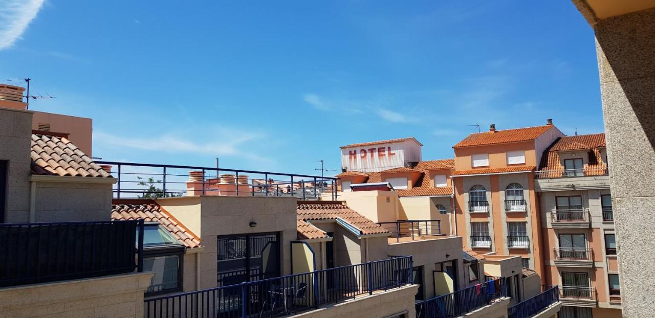 桑亨霍Piso Exterior A Escasos Metros De La Playa Panadeira Con Plaza De Garaje公寓 外观 照片